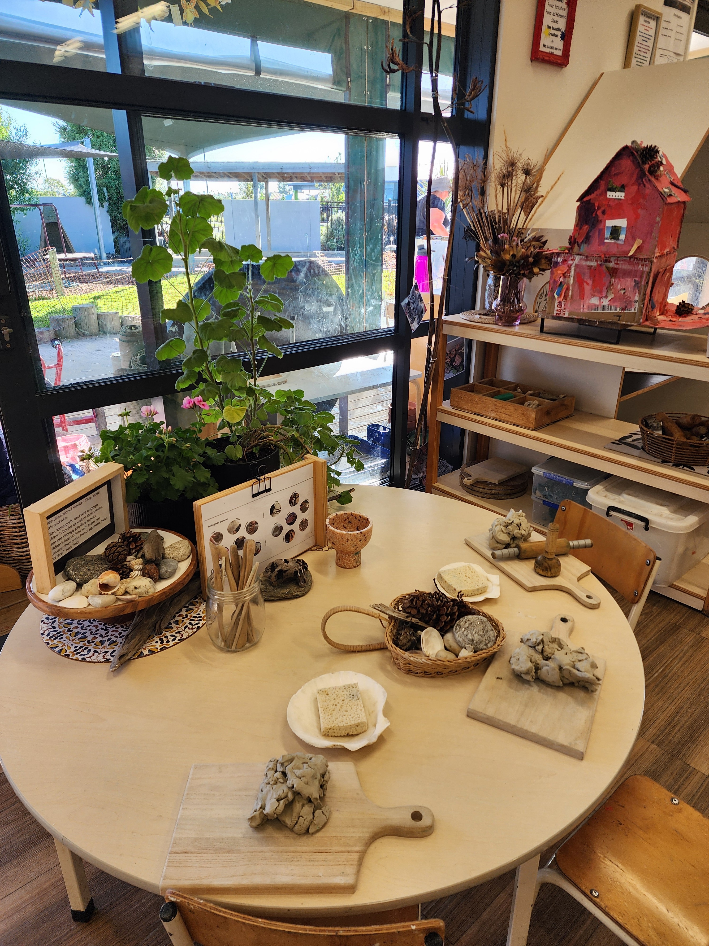 A young child exploring the outdoor environment during playtime.