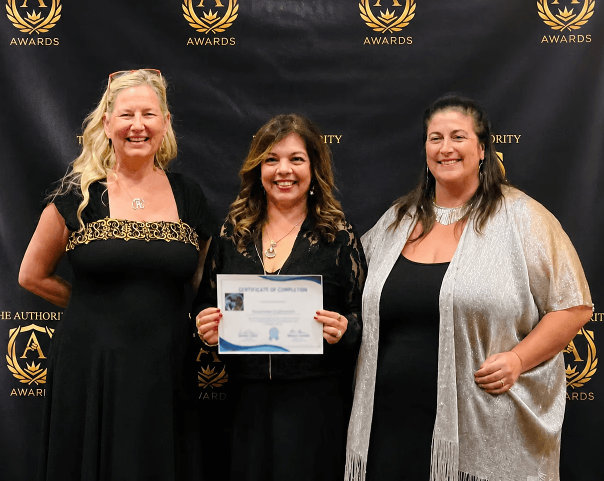 Shairose Gulamani and other Speakers at The Authority Awards. Three people standing together holding a Certificate.
