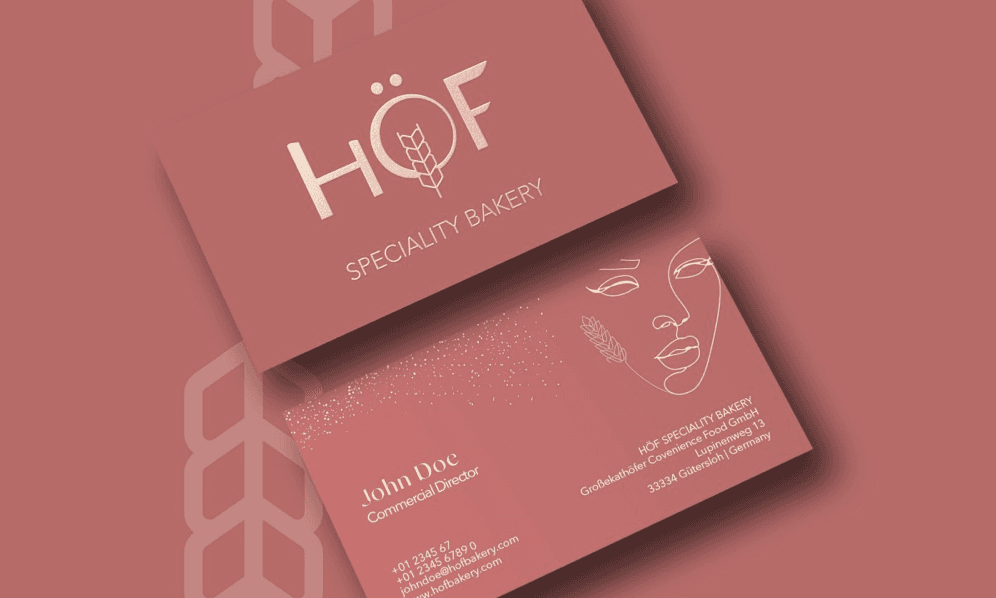 Woman holding bottle near face in soft light