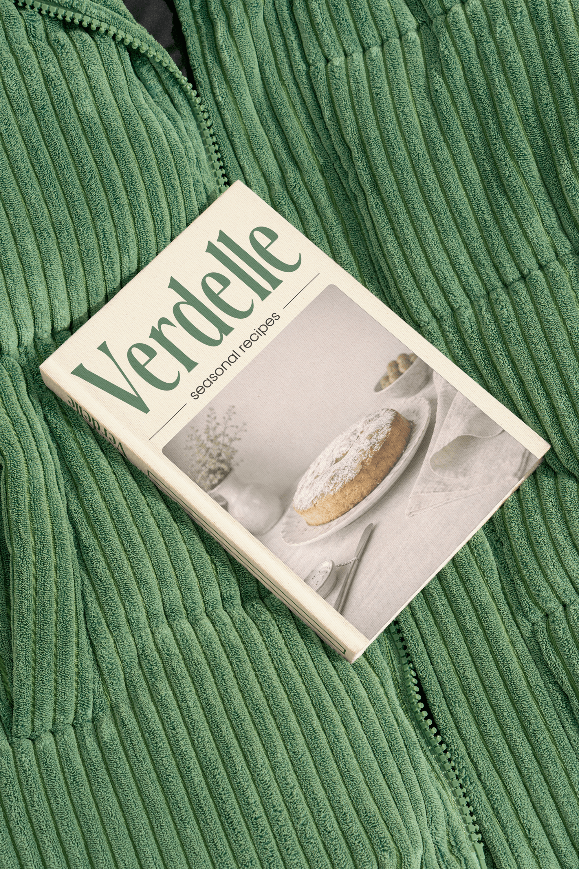 Verdelle seasonal recipes cookbook styled on green corduroy fabric