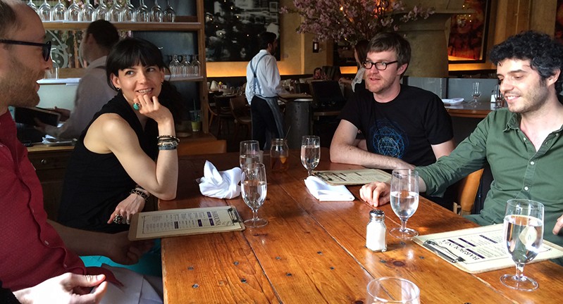 people sitting on the table and talking