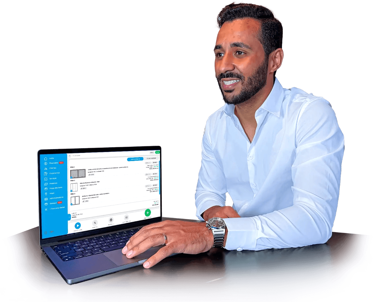 Man in white shirt looking at laptop screen with an open app.
