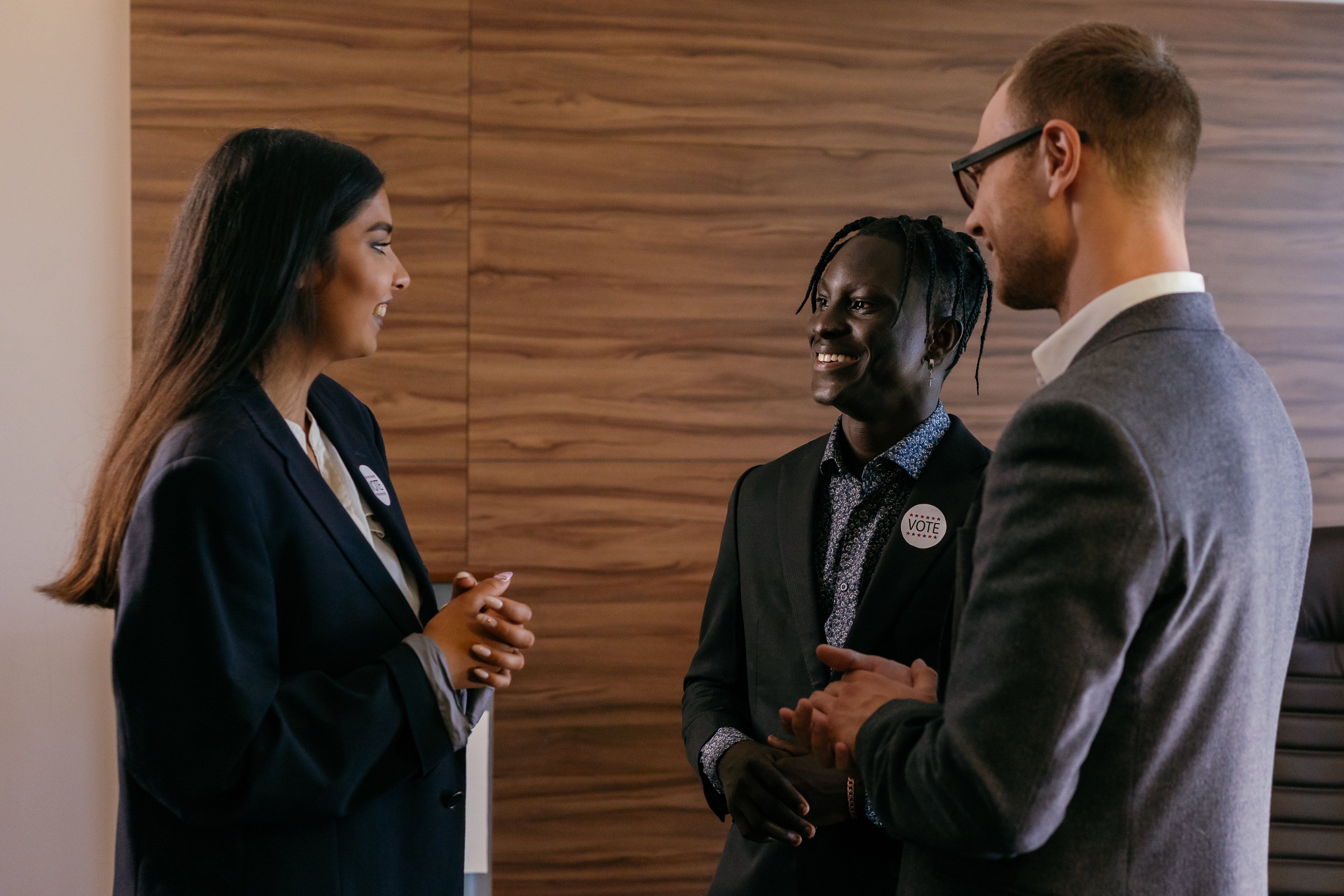 Clients talking at a networking social