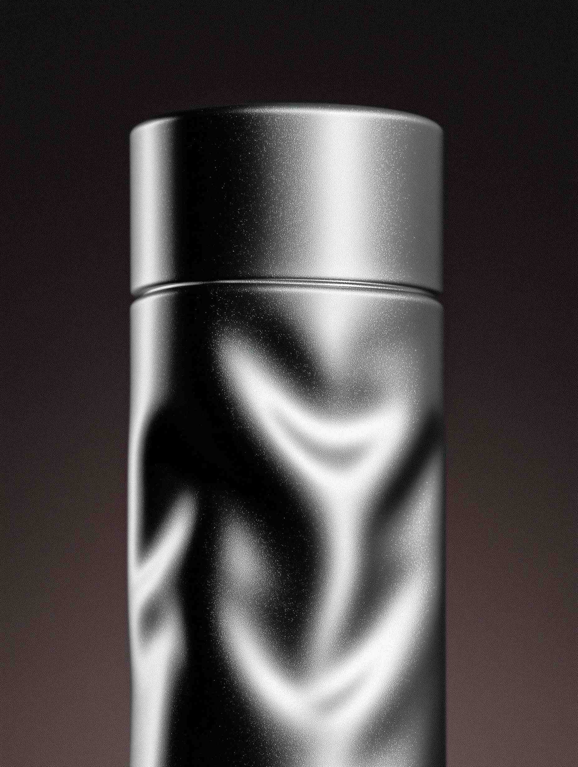 Dark chrome cylindrical container with metallic finish
