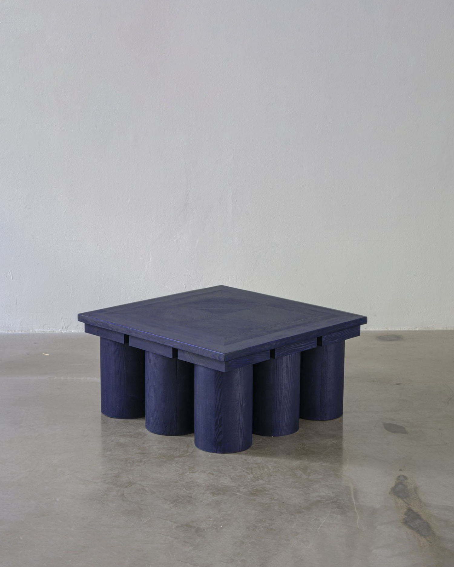 Kalokagathos low table crafted from solid ash wood with white and blue stain finish, by Jiří Krejčiřík.