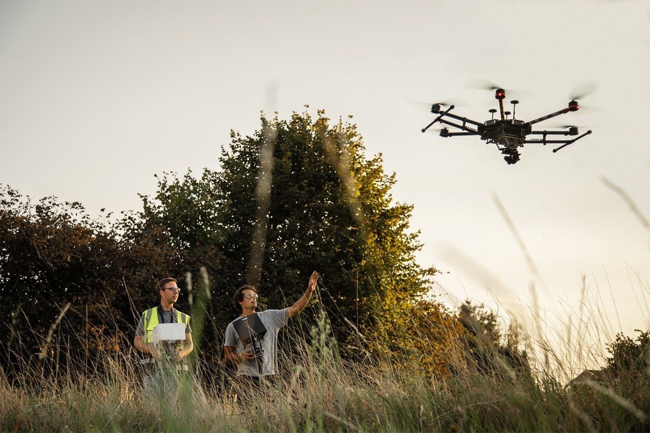 Stokedhouse drone catching the action from above, while two of our crew keep their eyes on the screen