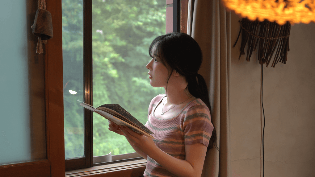 People using laptop and discusing