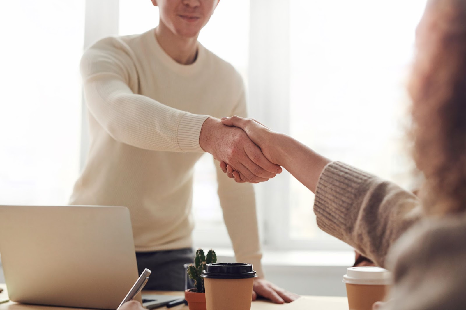 This striking image depicts the power of partnership and collaboration. It showcases two hands reaching towards each other, symbolizing cooperation and unity. The keywords "partnership," "collaboration," "unity," and "cooperation" resonate strongly with this image. The hands are joined together, representing a strong bond and mutual support. The image conveys the idea of working together towards a common goal, leveraging complementary strengths, and creating synergies. It evokes a sense of teamwork, trust, and shared success through effective partnerships and collaborations.