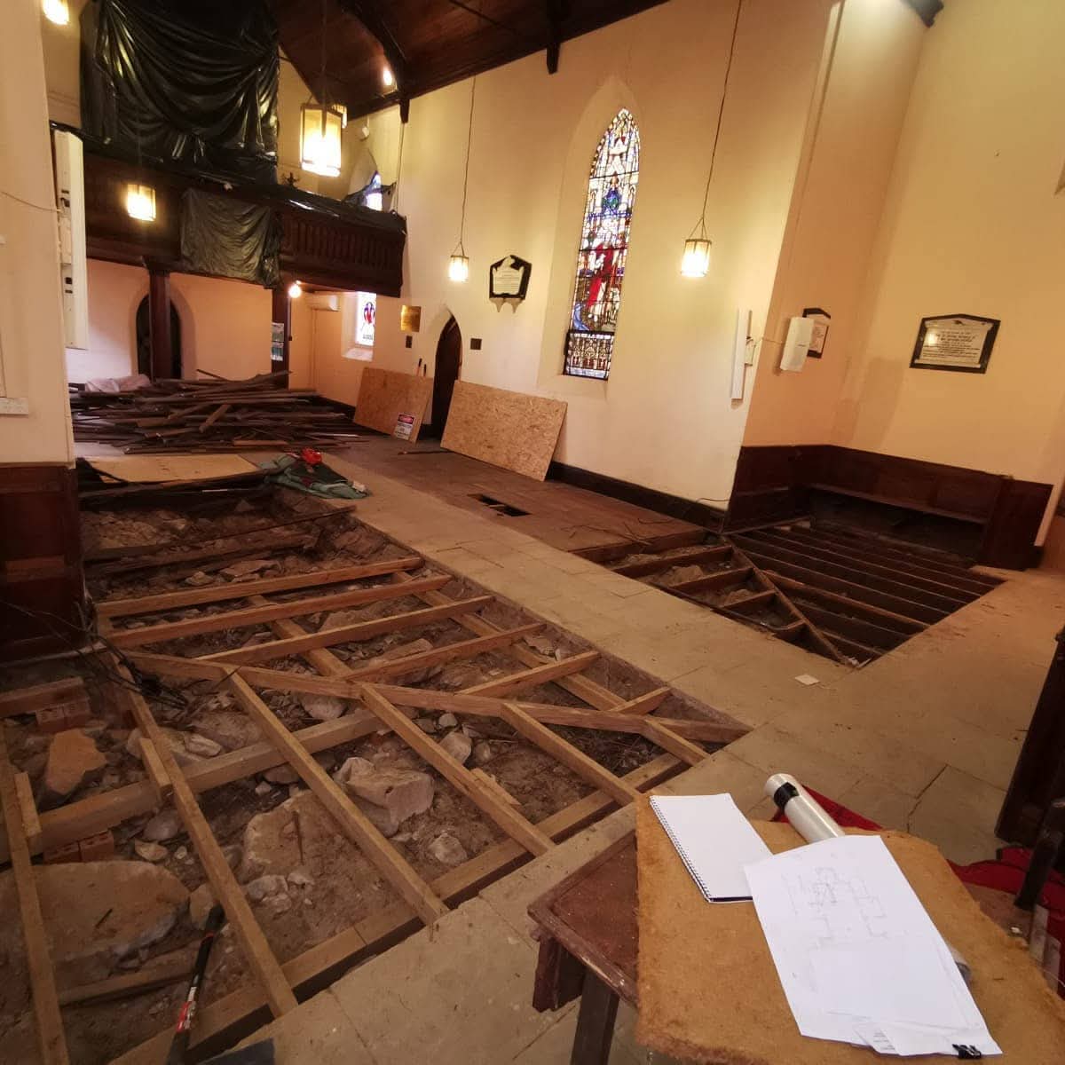 Termite and pest infestation at a church with floors pulled up