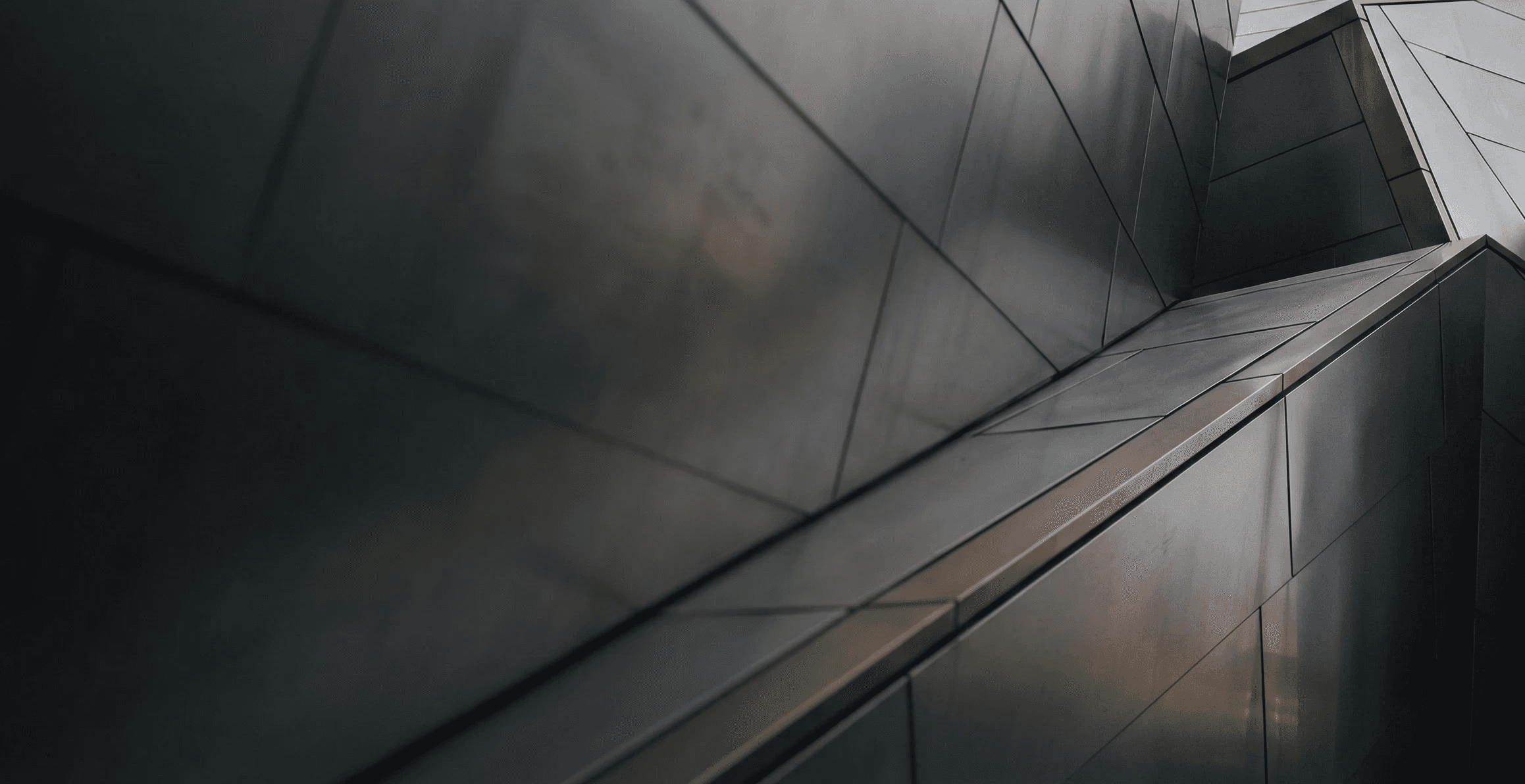 person wearing watch near laptop (Background Removed)