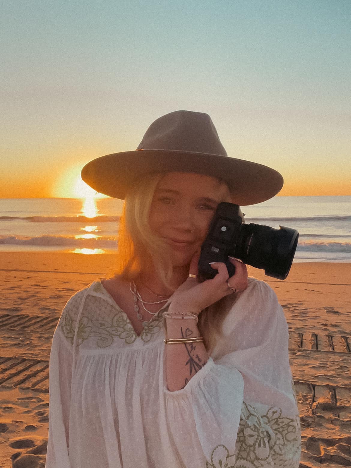 Photographer holding camera