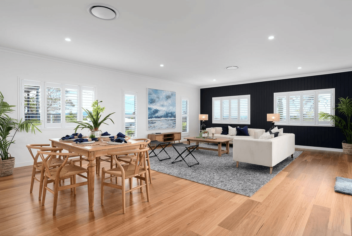 Open-plan Queensland dining and kitchen space with durable hybrid flooring, offering slip-resistant comfort and stain-resistant surfaces for daily family life.