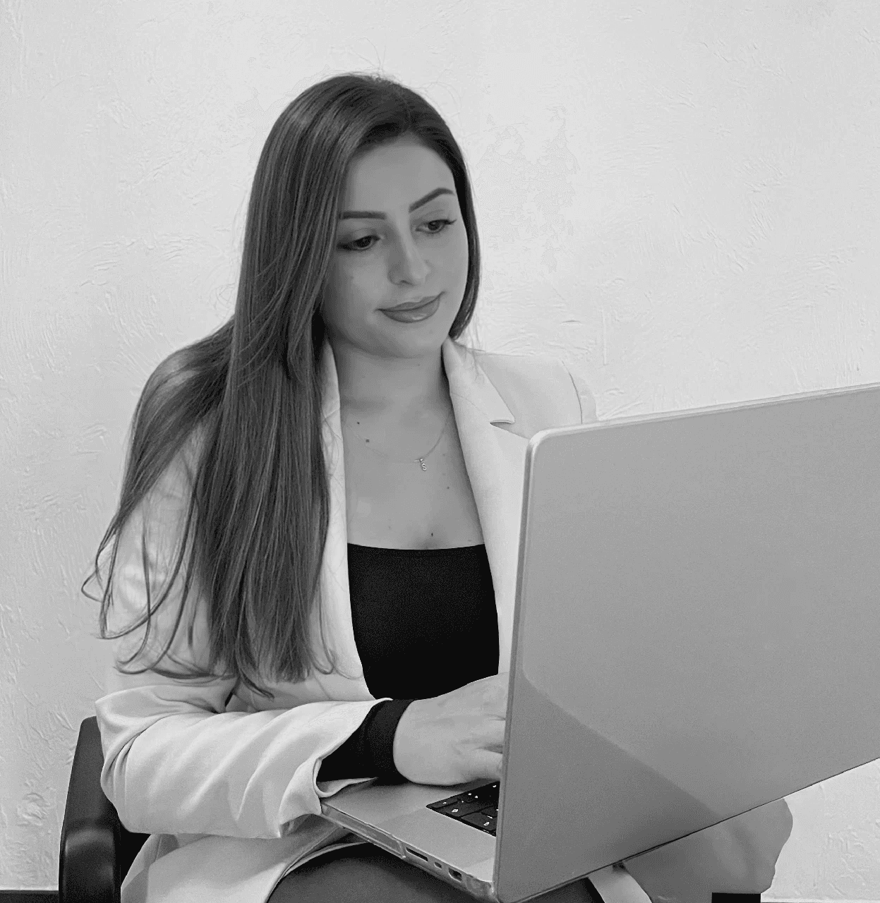 a blurry photo of a person standing in front of a wall