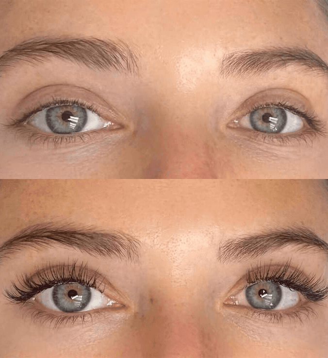 Woman looking up and smiling, showing lash extensions in profile.