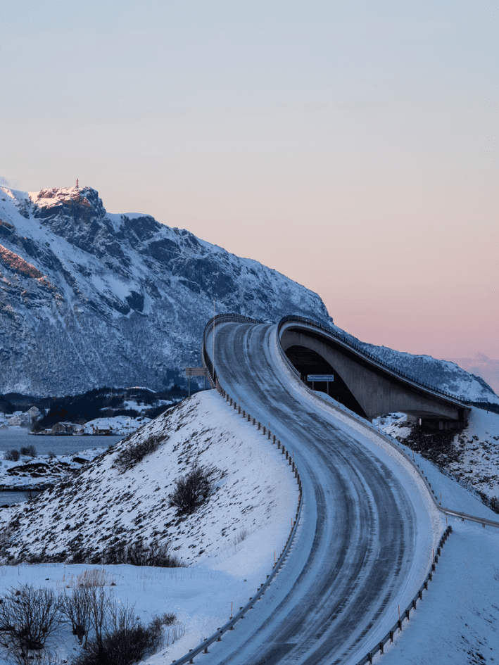 Two people stood ona a cliff