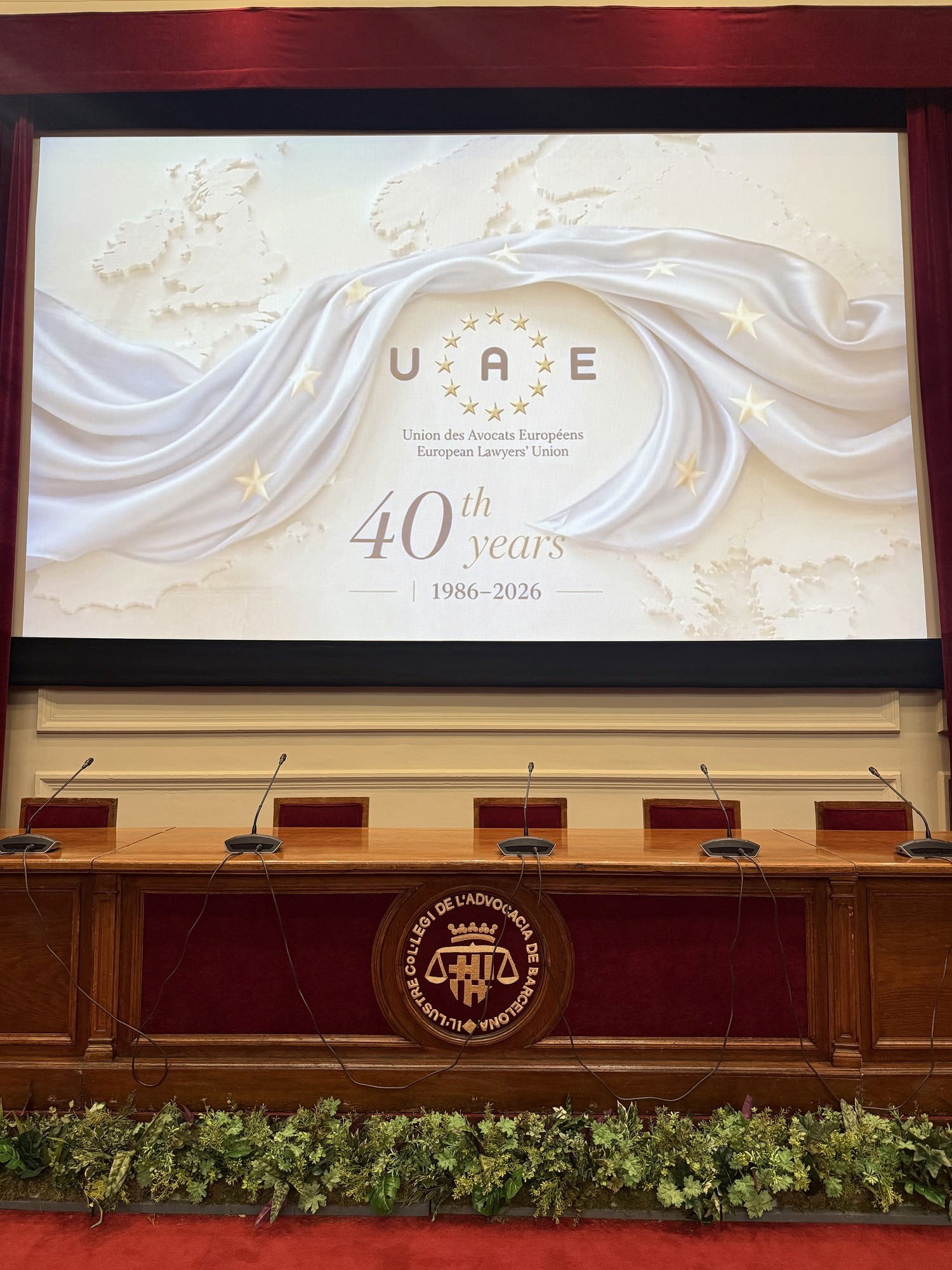 UAE 40th-anniversary presentation projected in a formal auditorium