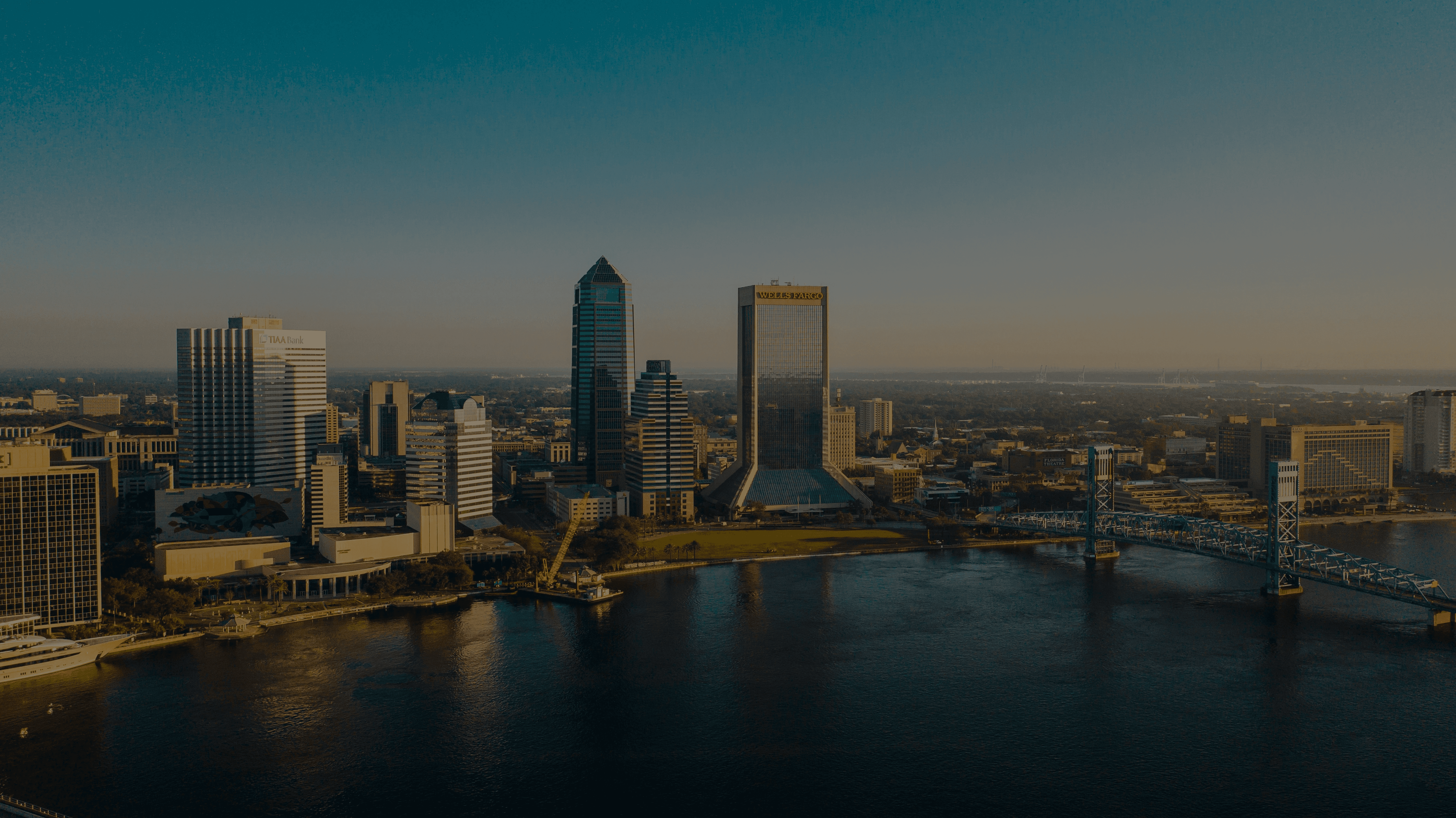 city skyline under blue sky during daytime