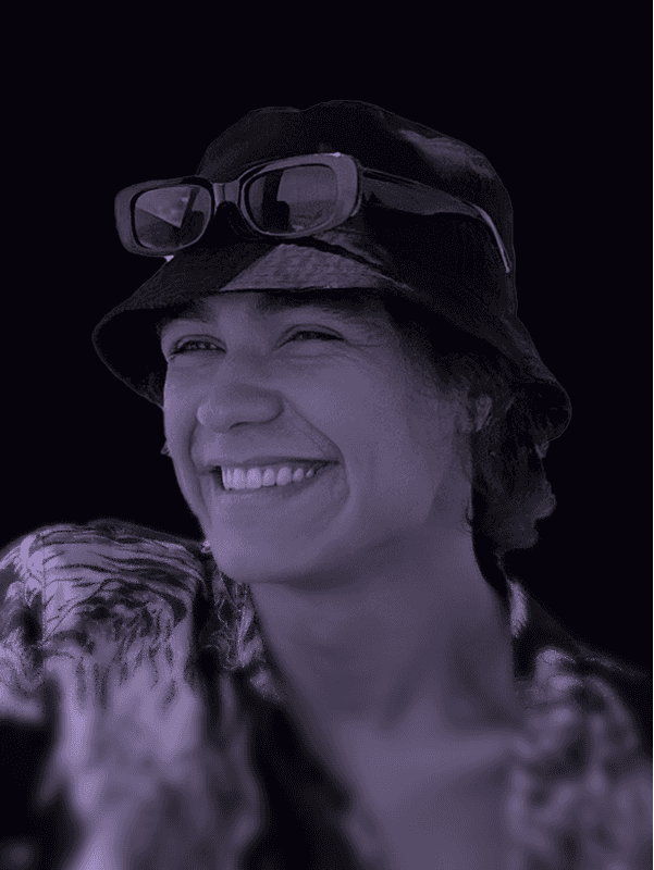 Professional portrait of person on a modern purple gradient background, business headshot for digital branding and team profile.