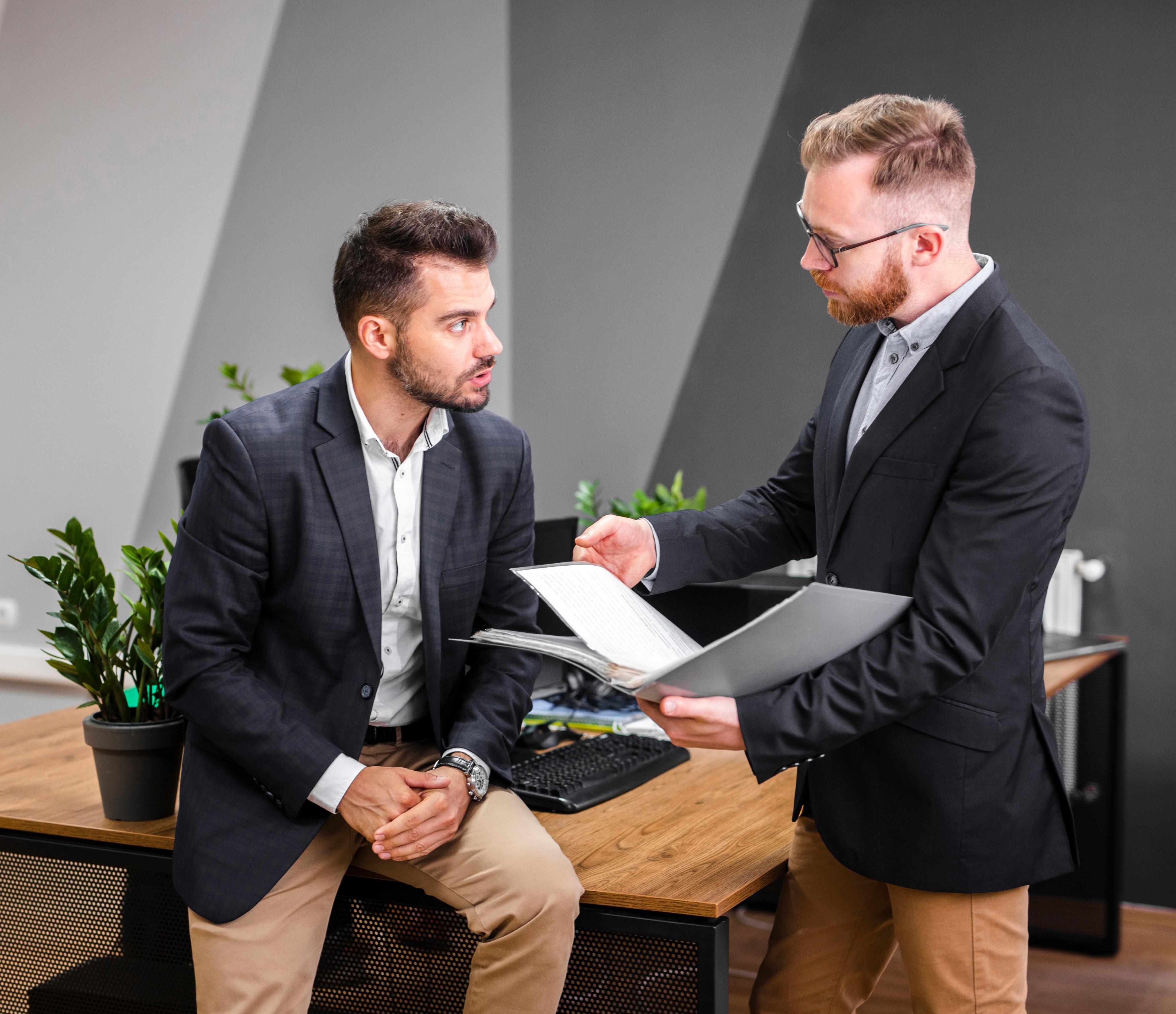 Two men are talking to each other