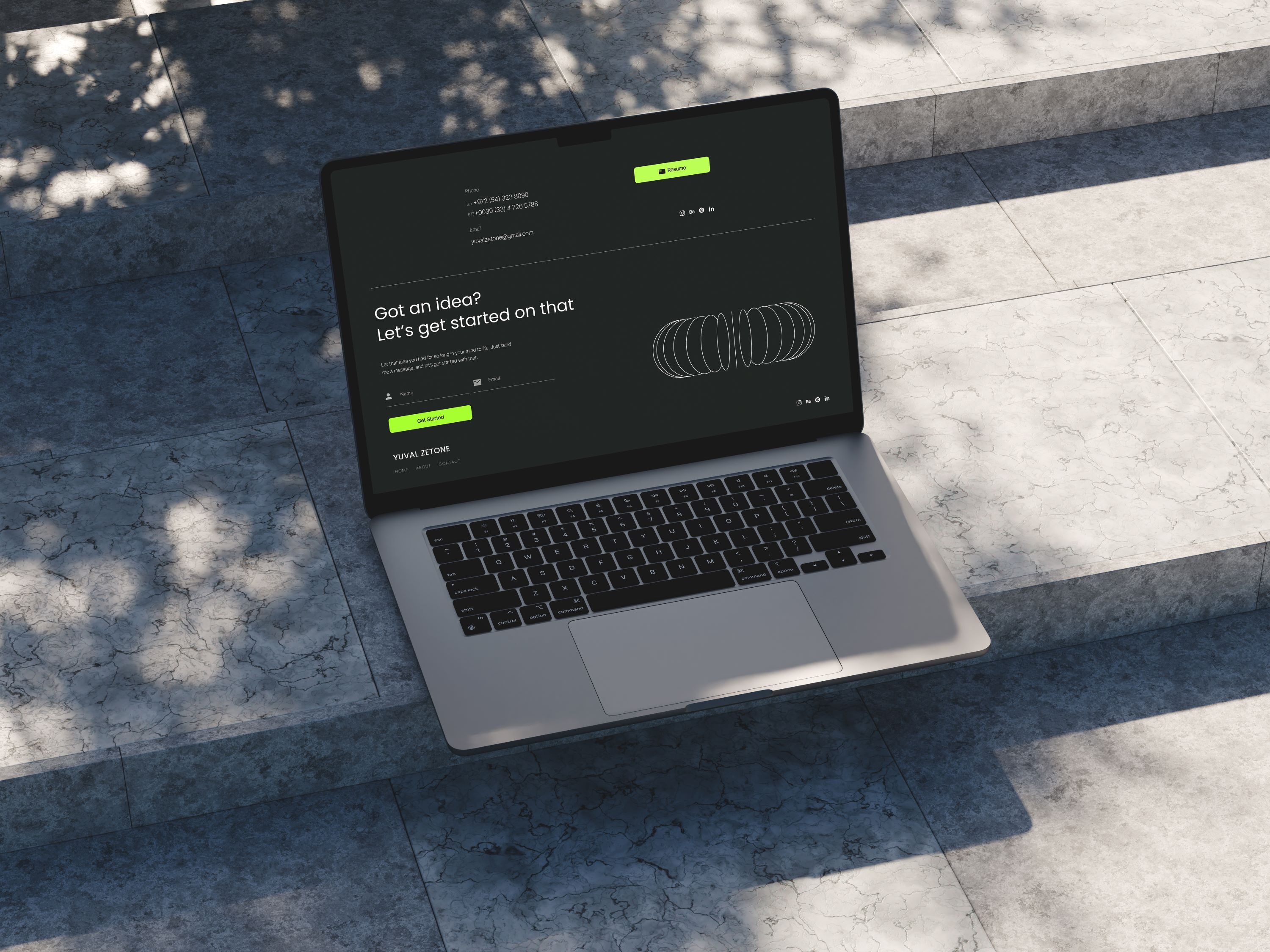 A mockup of a laptop for Yuval footer screen 