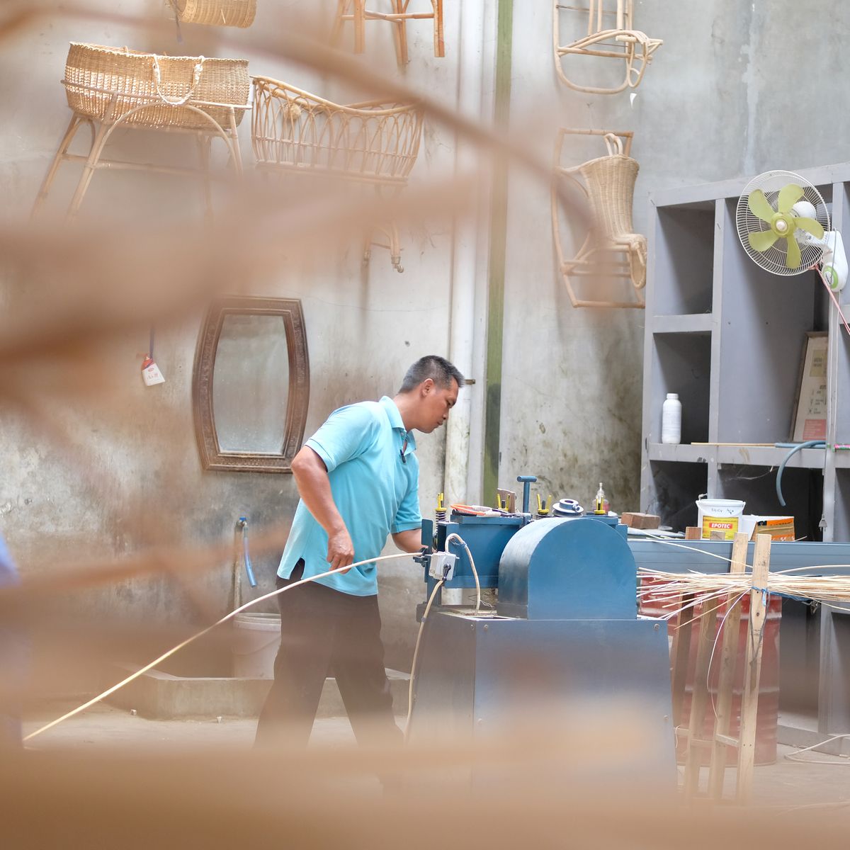 Handwoven rattan lounge chair with natural finish, designed for indoor and outdoor comfort