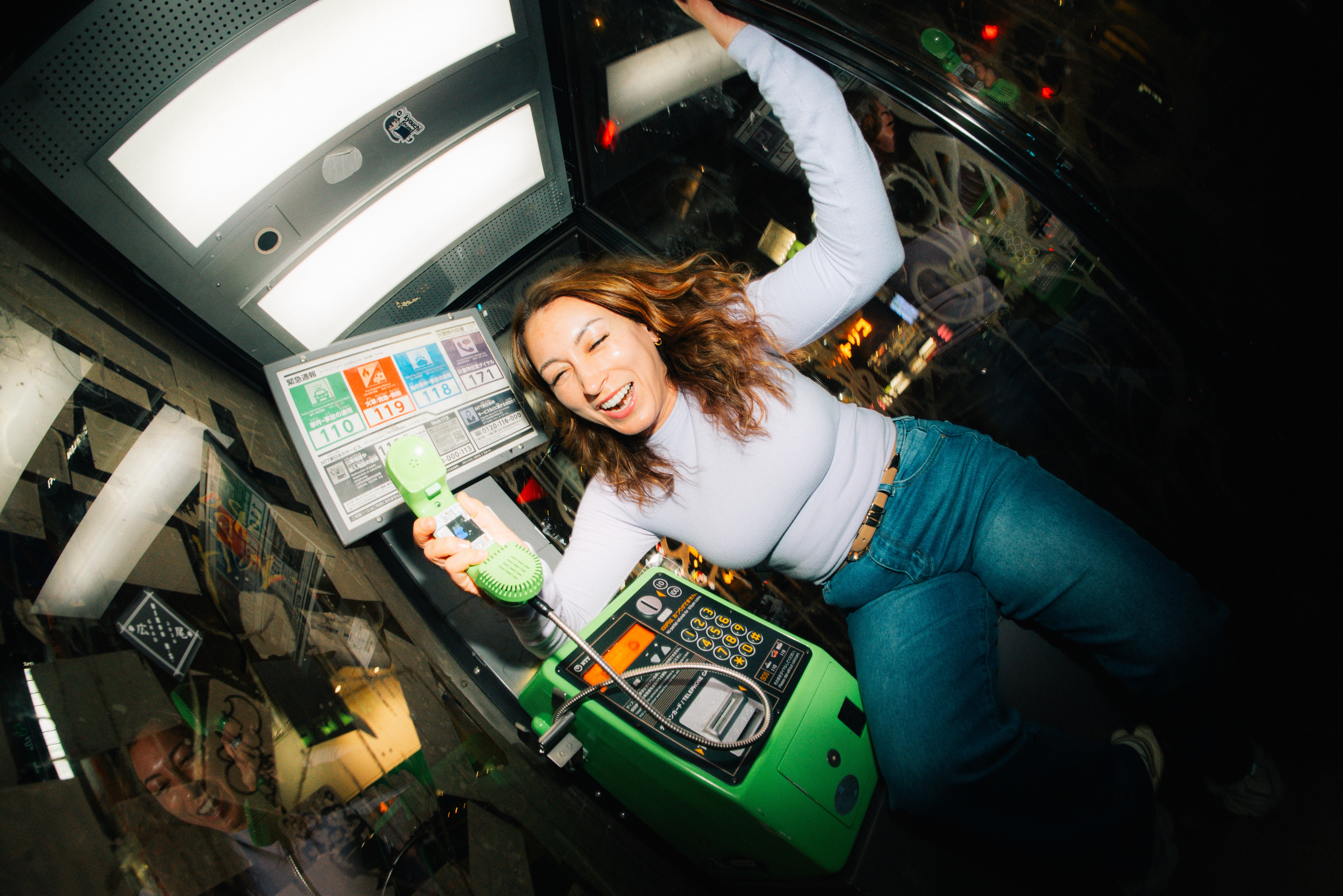 Bryna in Shibuya in a phone booth