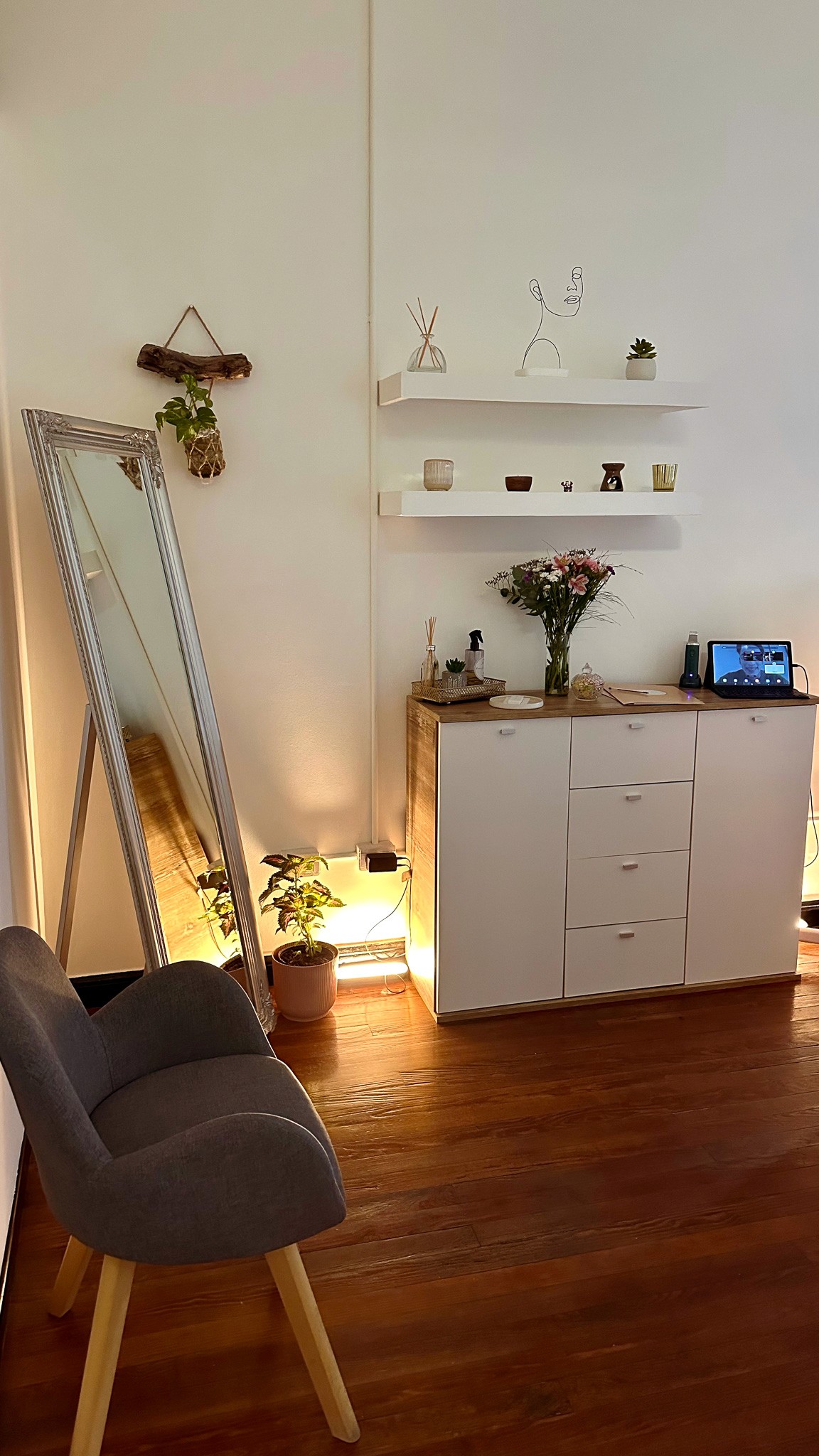 A luxurious indoor pool area with a panoramic view of a city at sunset. Comfortable lounge beds with soft fabrics surround the pool, while warm ambient lighting enhances the sophisticated atmosphere. The space combines modern elegance with a tranquil vibe.