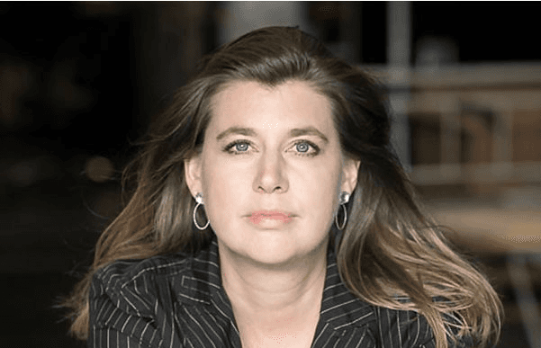 female photographer with red hair