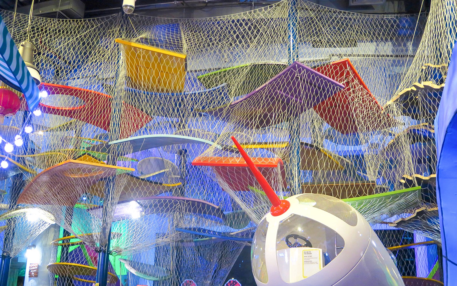 Colorful climbing structure at KidsSTOP Singapore.