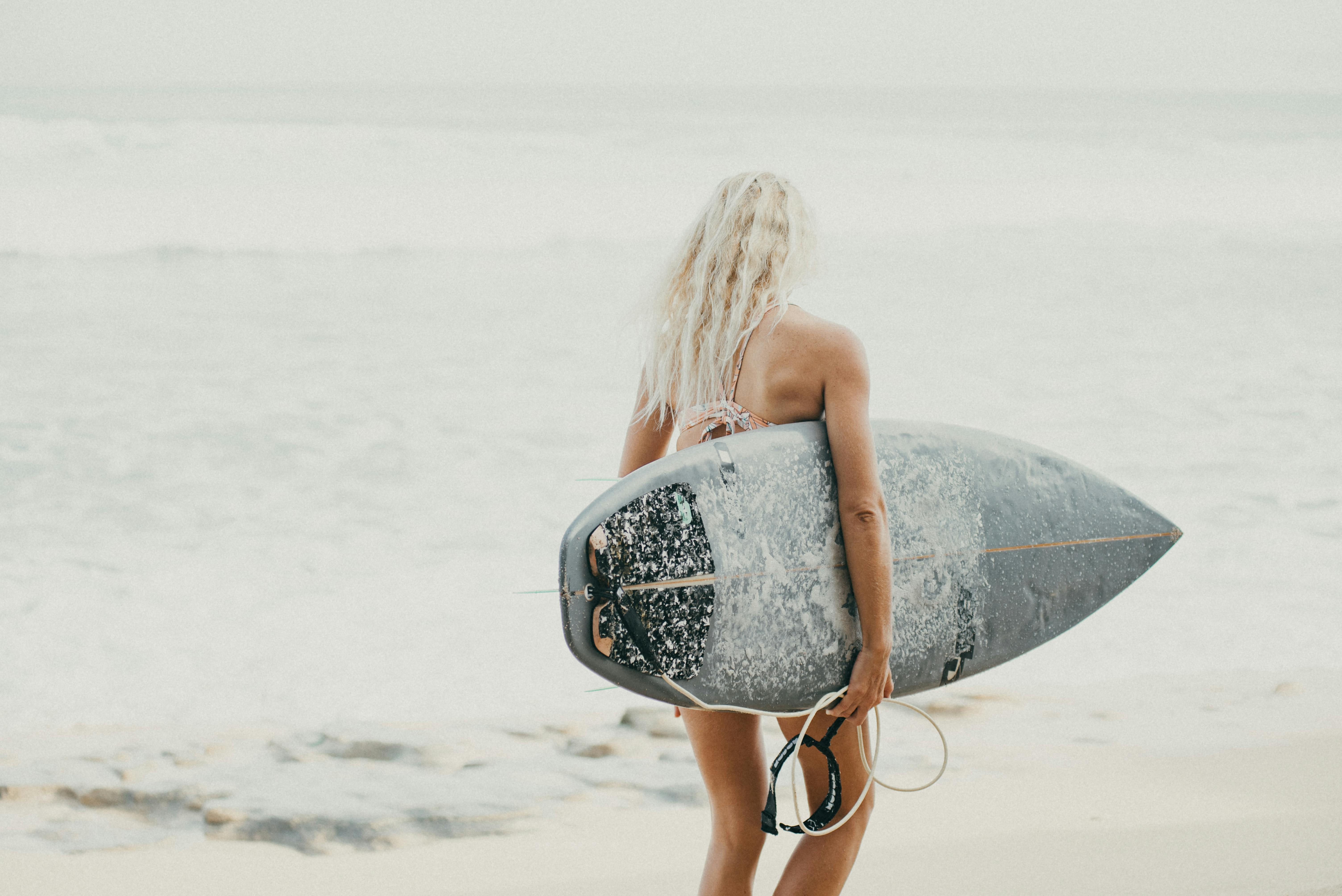 woman with a surfboard