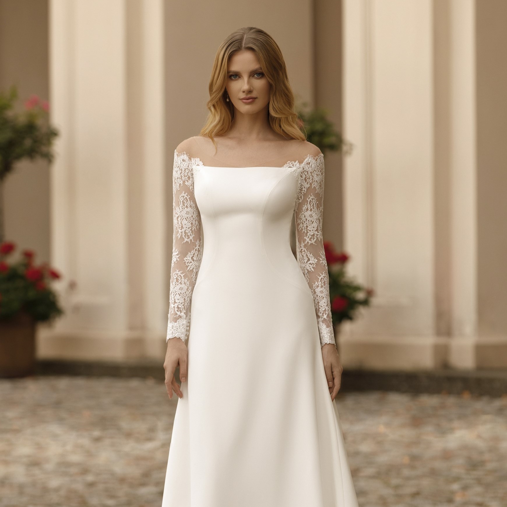 Brautkleid mit romantischen Carmen-Ärmeln aus Spitze