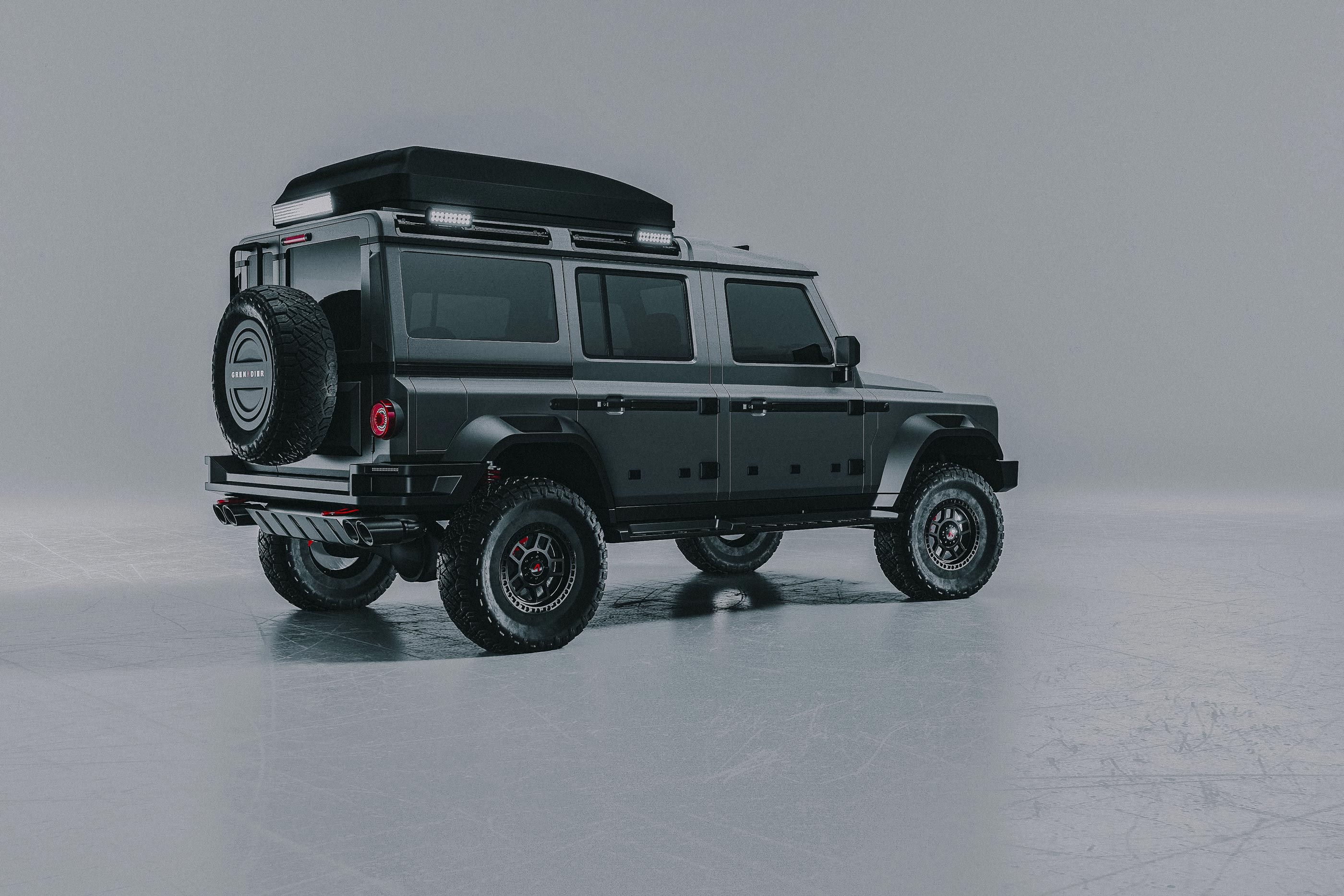 Photo of the INEOS Grenadier in grey, 3/4 rear view