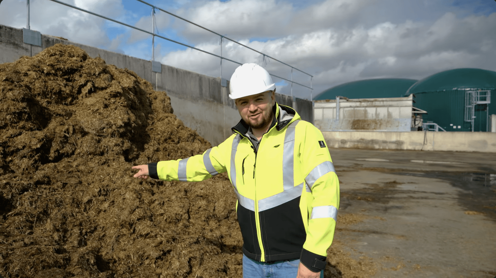Modern spiral staircase with wooden accents and lighting