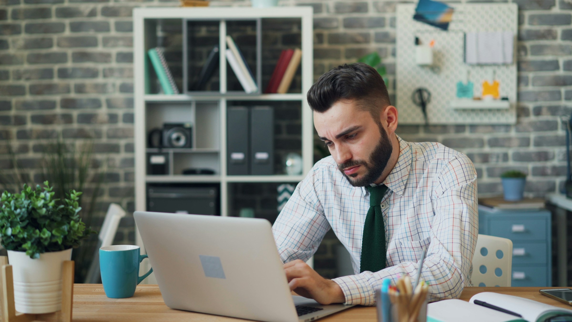 analyst working hard - Which Research Tool Is Best Suited to Gathering Qualitative Market Data