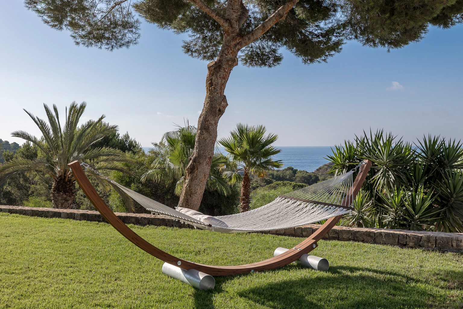 Garden hammock at an exclusive luxury villa Ibiza—private holiday retreat VIP estate property