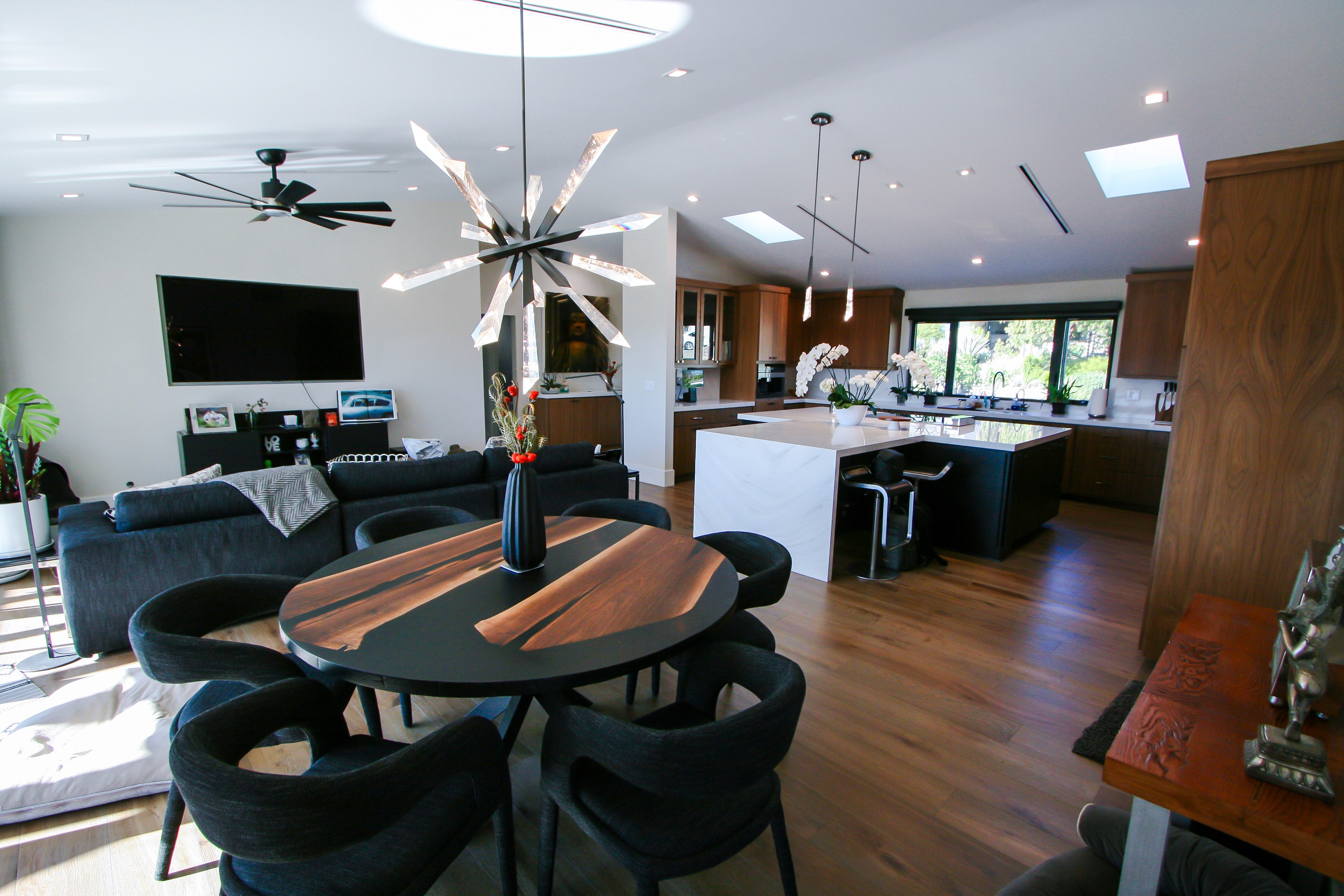 contemporary living room with kitchen in the distance