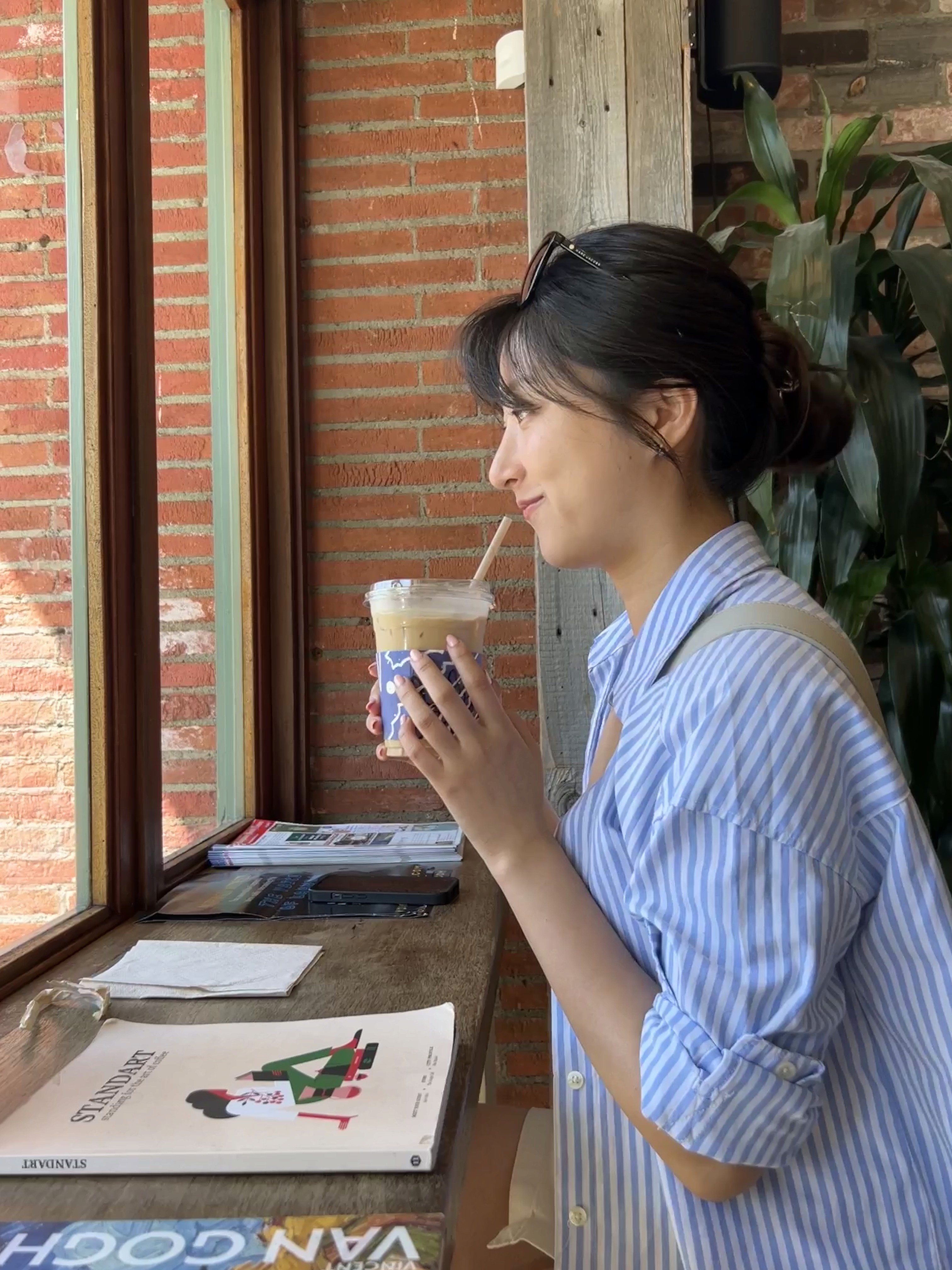 christina sipping coffee