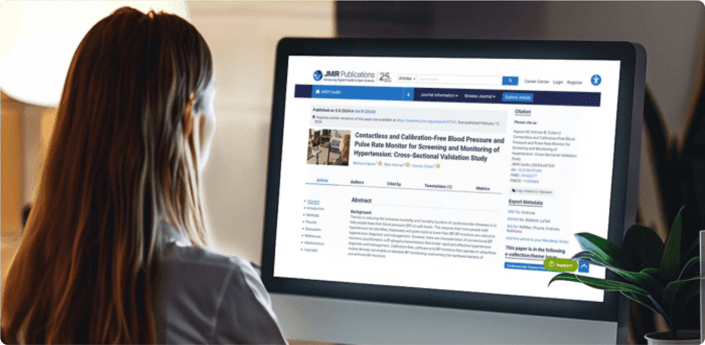 Woman reading a paper on a big screen