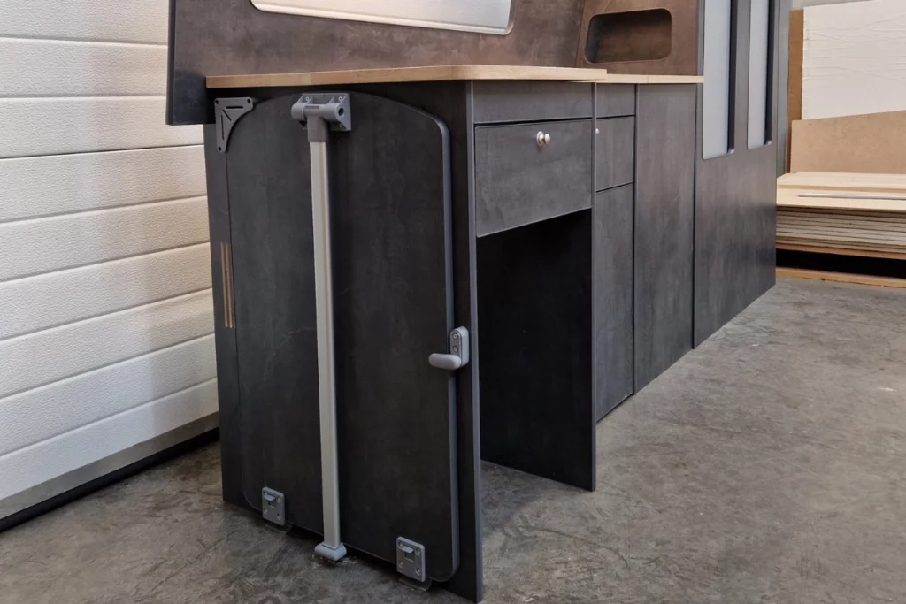 Kitchenette placement for small campervan conversion