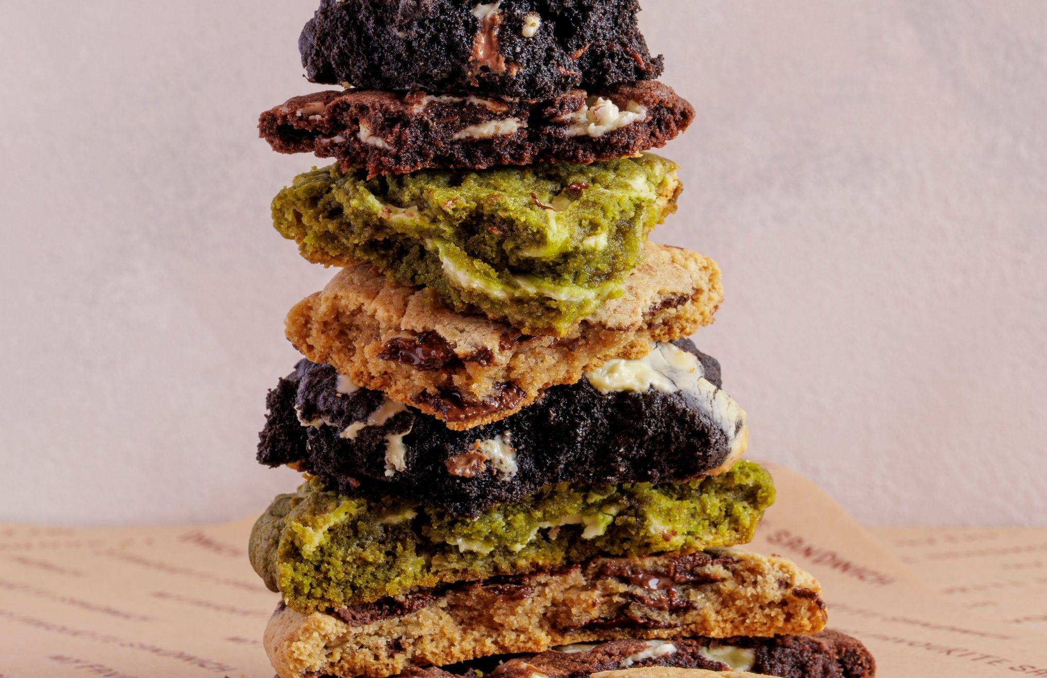 A pile of different flavor cookies