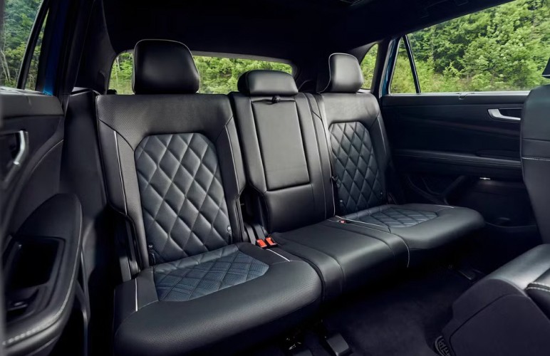 black car steering wheel during daytime