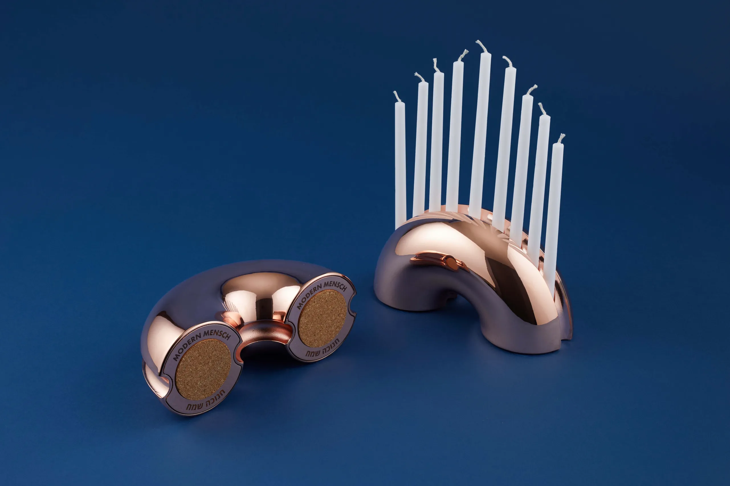Modern Mensch Nosh Menorah products shown in multiple finishes