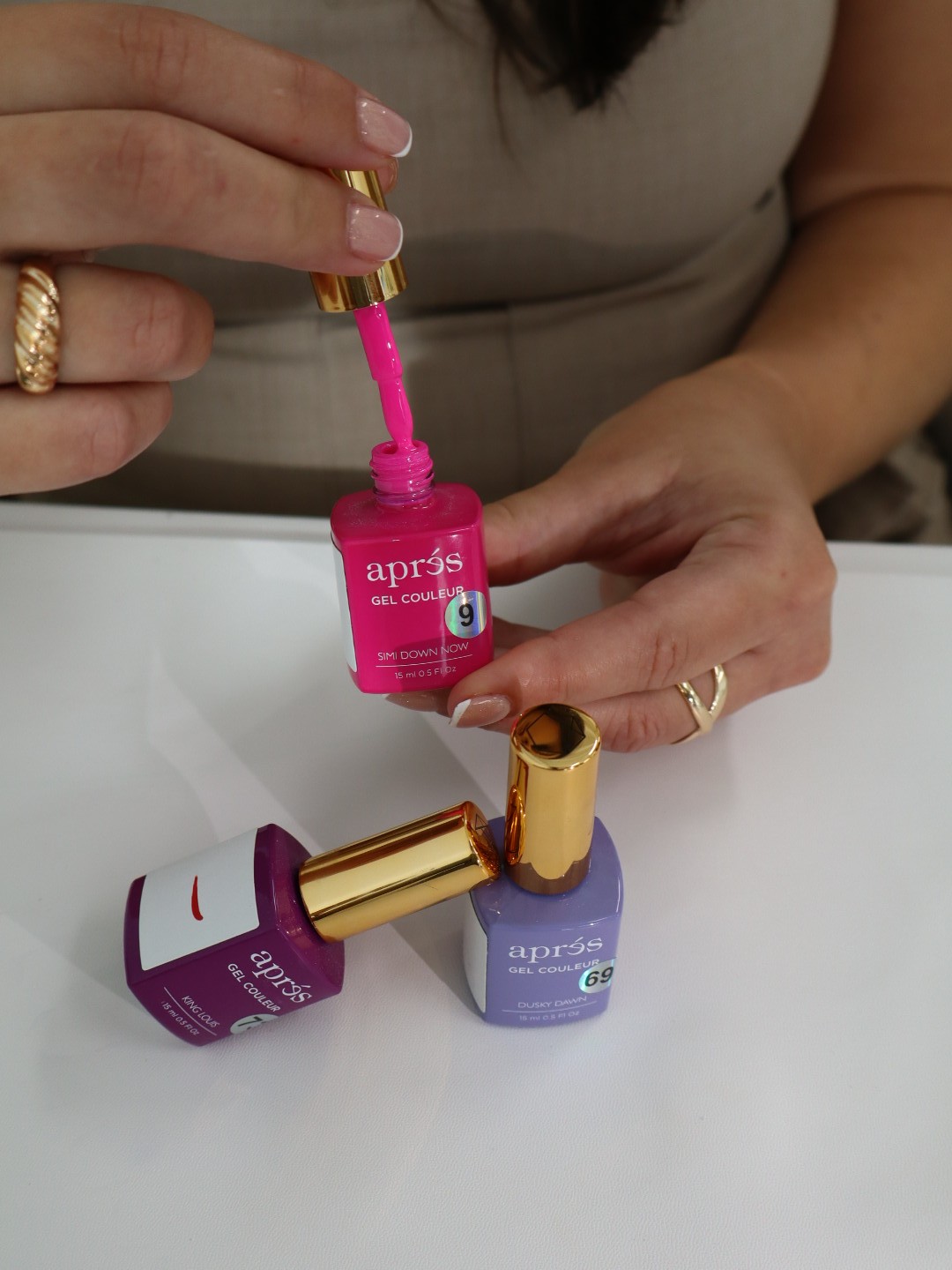 Woman applying skincare on her face