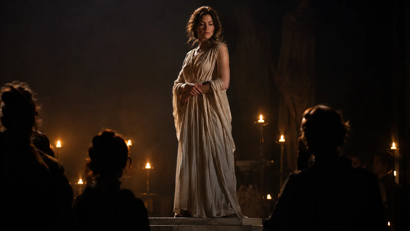 Ada as Hermione standing as a statue by candlelight
