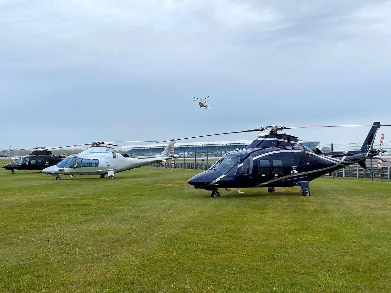 Luxury private jet flying over snowy mountain range