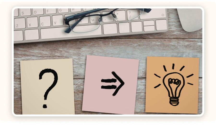 Question mark, arrow, and lightbulb