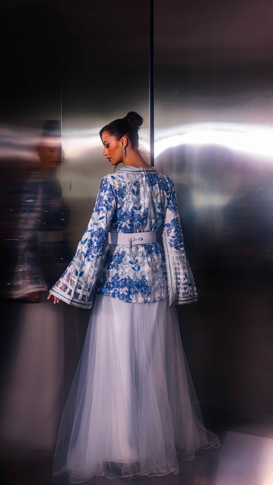 Light blue Moroccan bridal caftan with intricate hand embroidery, luxury handcrafted piece for weddings in Bahrain