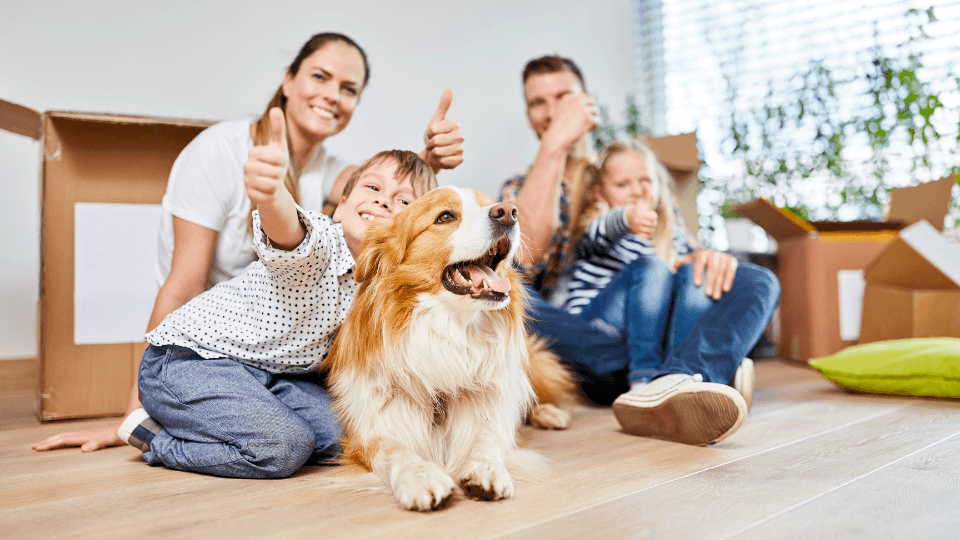 Kids and dog with thumbs up
