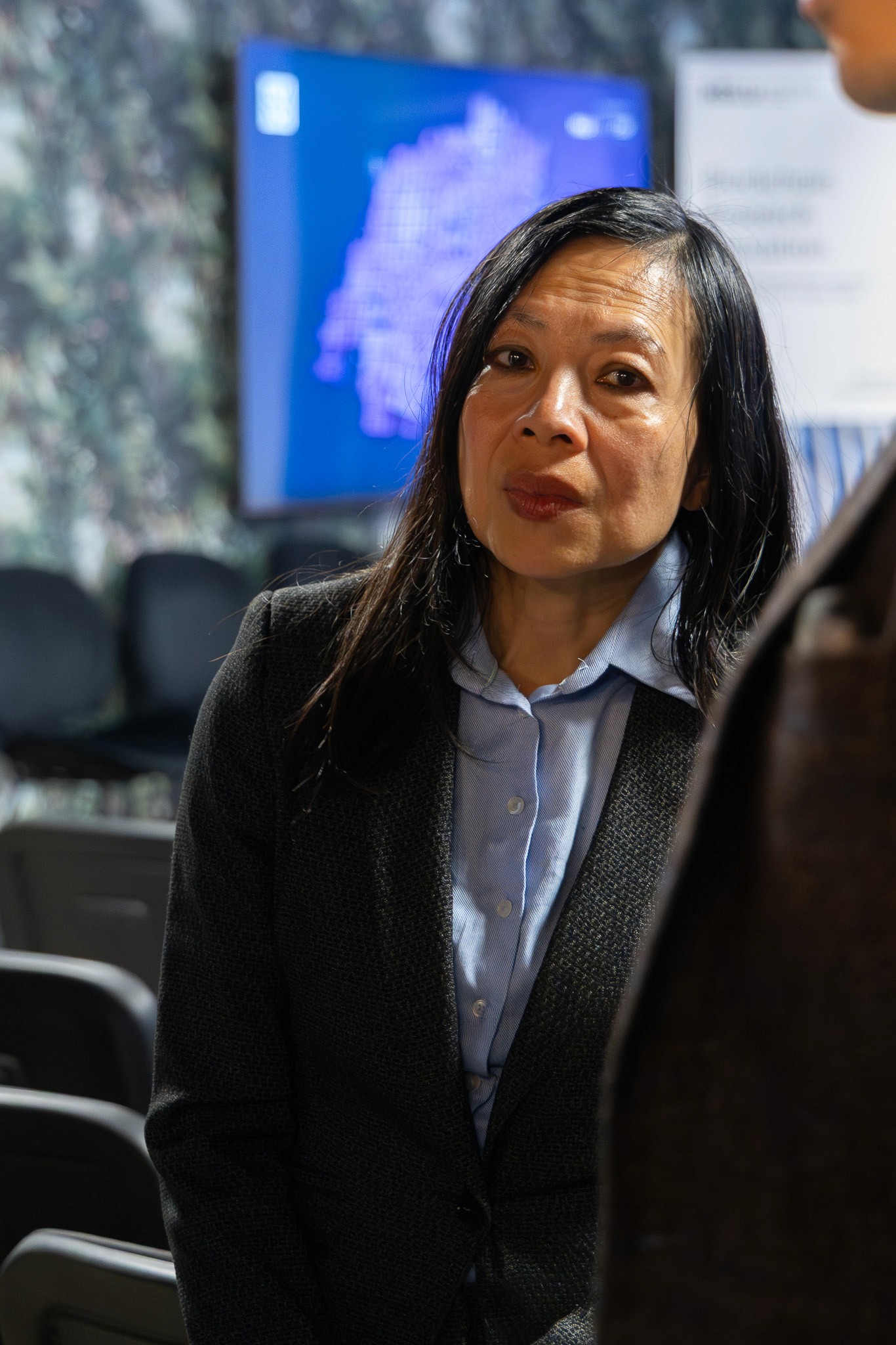 Professional attendee at a blockchain networking event in Zug.