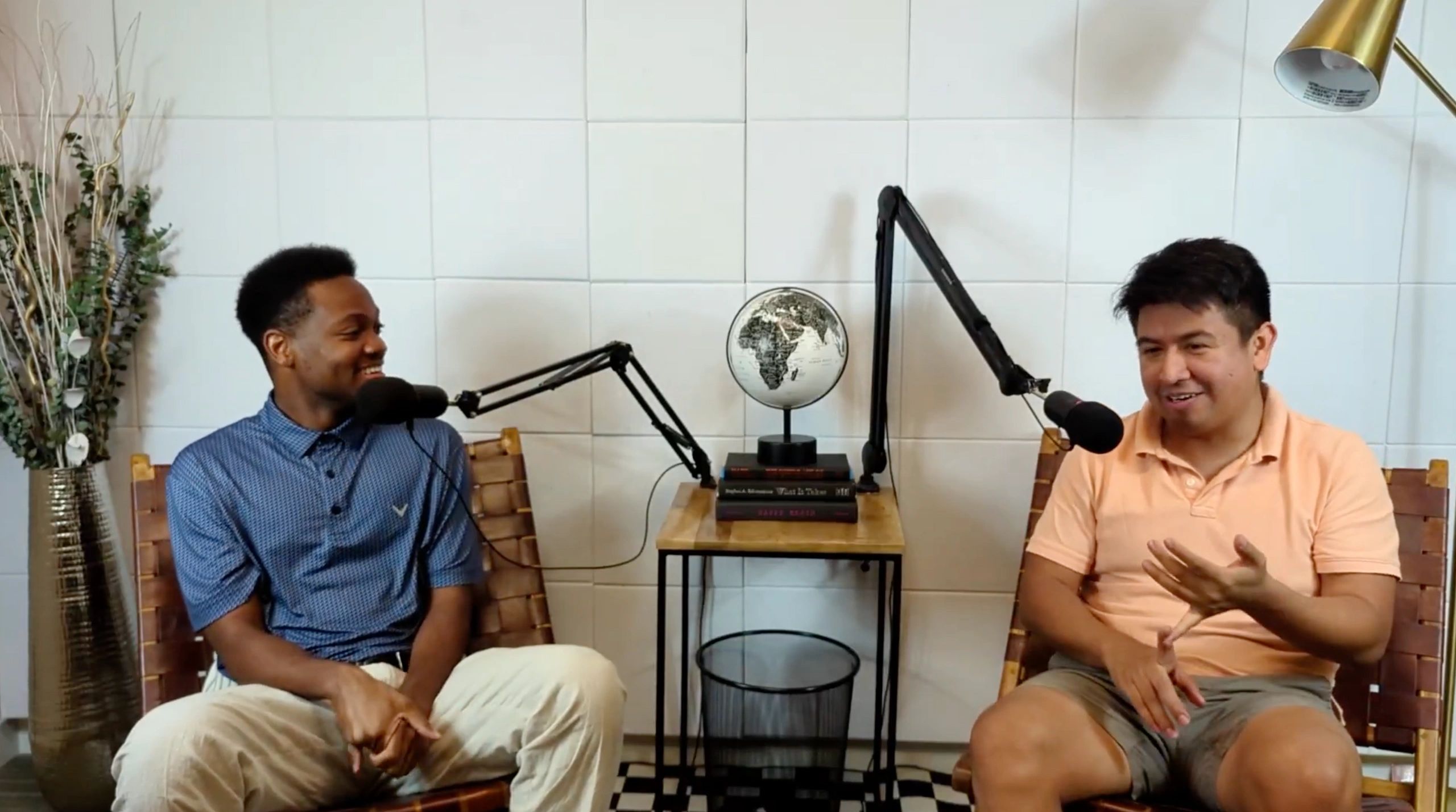 a black and white living room with a large tv